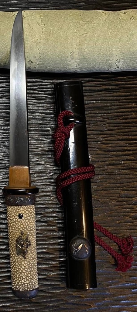 This is a very small Tanto/ Kaiken mounted in a equally lovely Koshirae —— the b