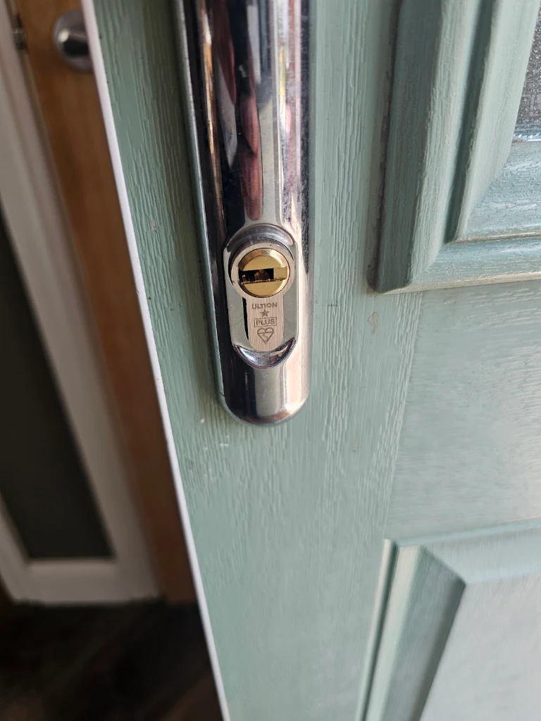 Ultion PLUS 3-star anti-snap euro cylinder fitted to a green composite door by SIDE Locksmiths