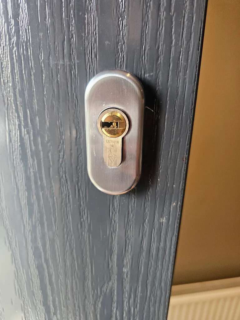 Ultion anti-snap euro cylinder installed on a dark grey composite door by SIDE Locksmiths