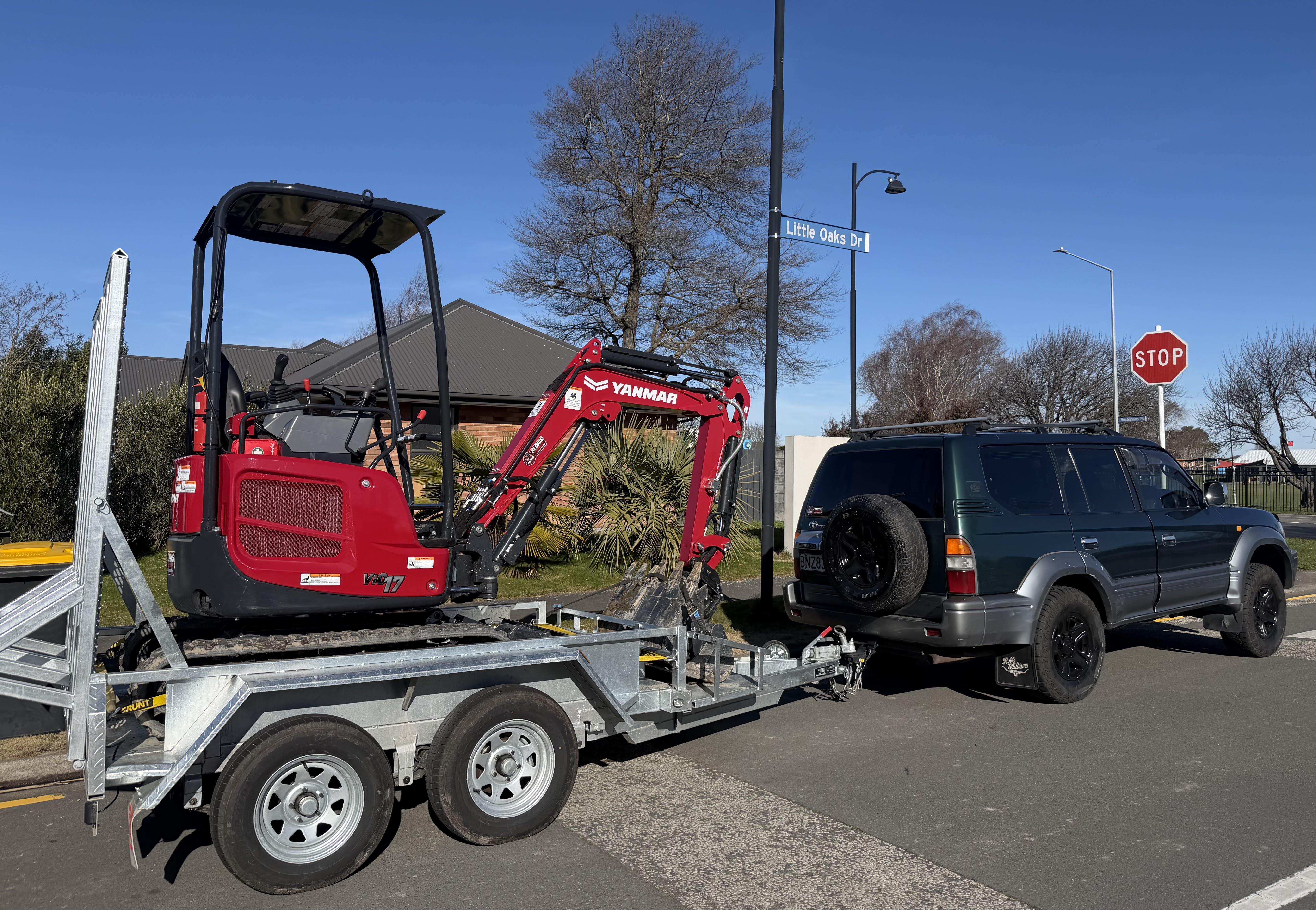 Floris Excavator Hire — Yanmar ViO17 excavator on trailer, ready to go