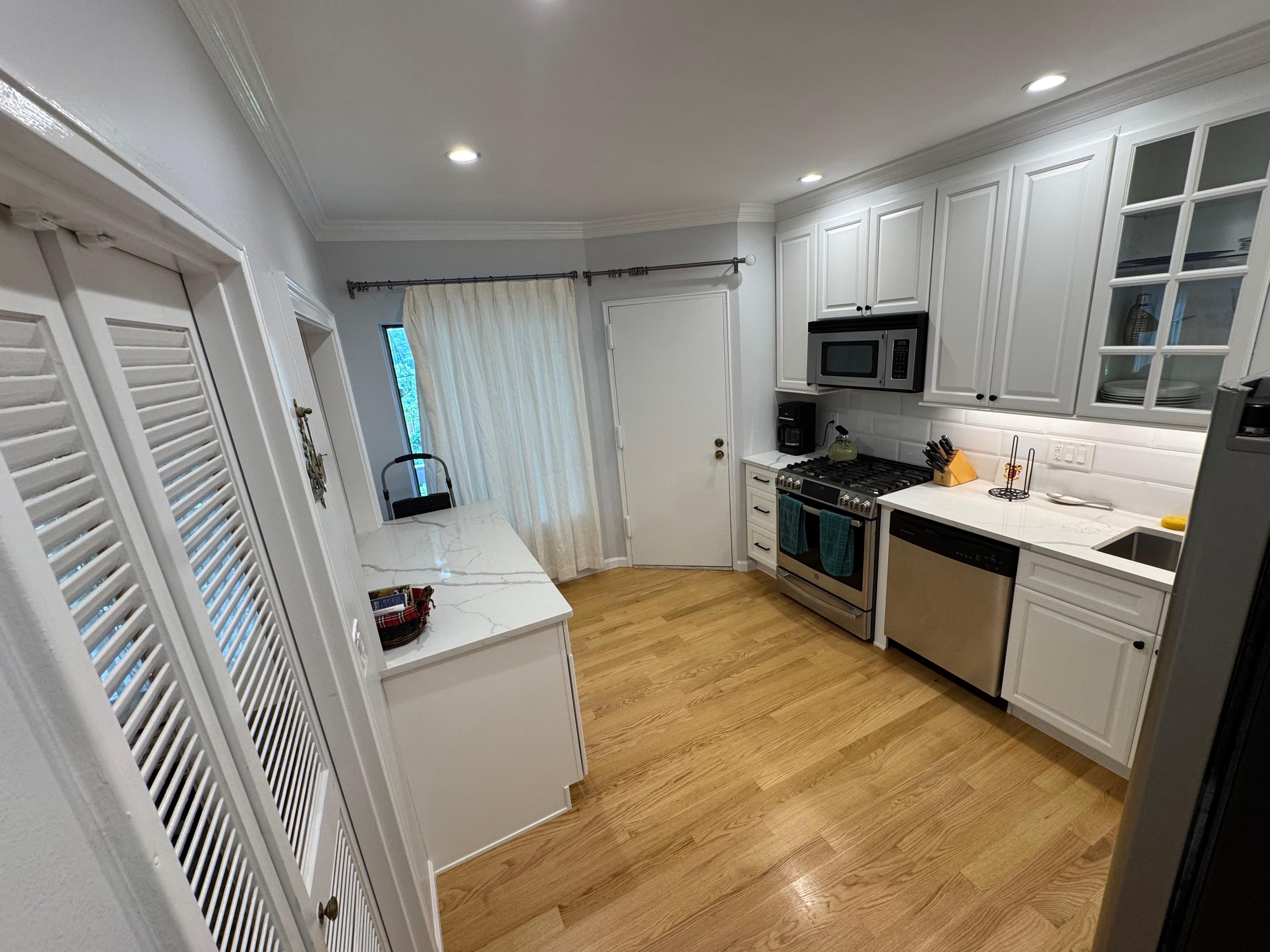 After — Kitchen Renovation — Subfloor to Hardwood