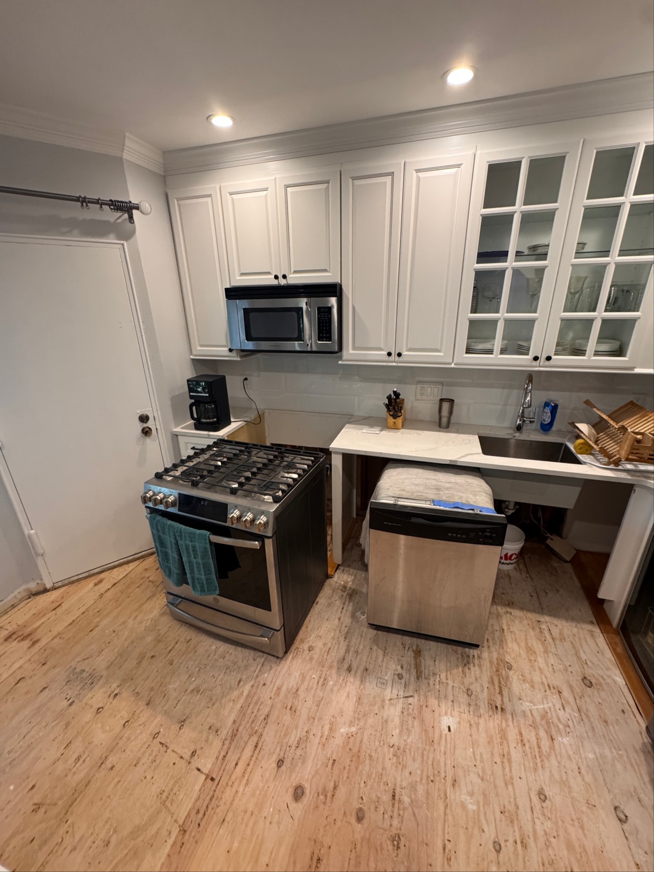 Before — Kitchen Renovation — Subfloor to Hardwood