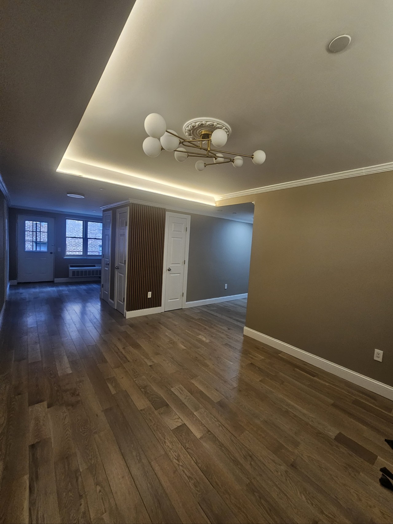 After — Living Room — Hardwood & Accent Wall