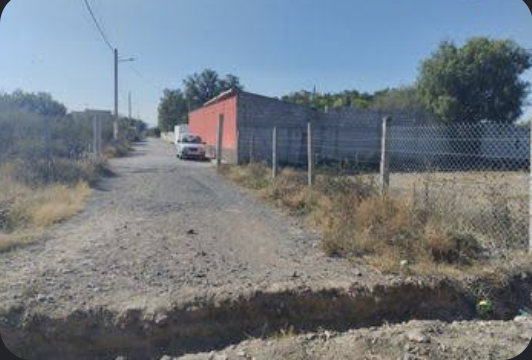 Terreno cercado con malla en terracería de Toluca