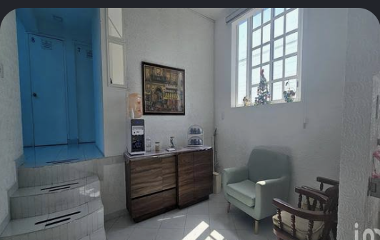 Oficina con recepción y sala de espera en Mérida