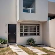 Casa Minimalista con Volúmen en Voladizo en Misión de San Javier