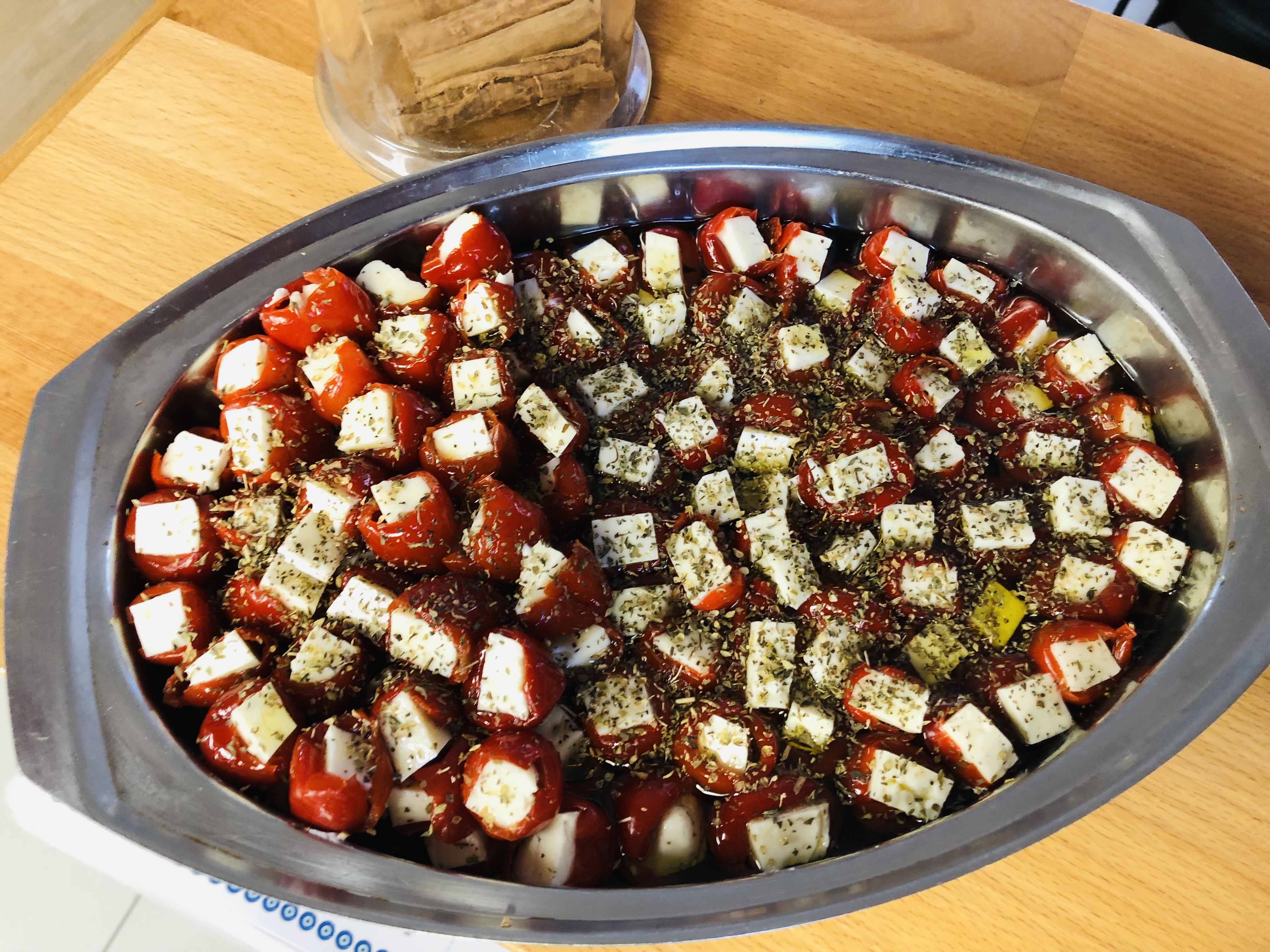 Stuffed red bell peppers filled with feta cheese and herbs