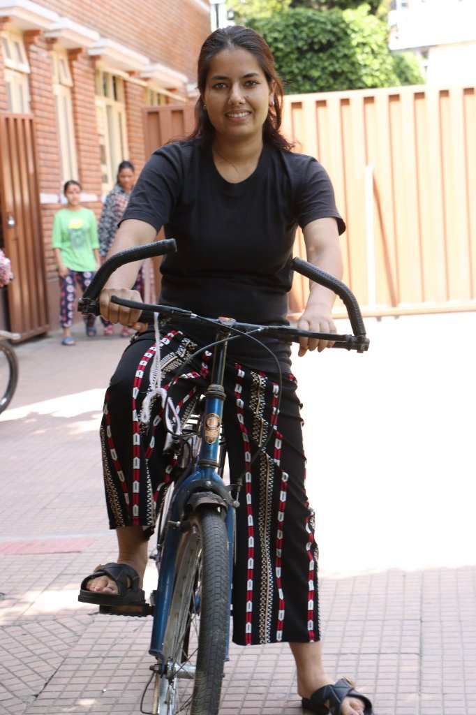 Young woman on a bicycle
