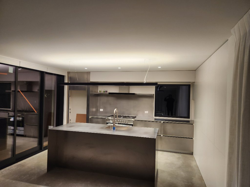 Stainless steel kitchen at night