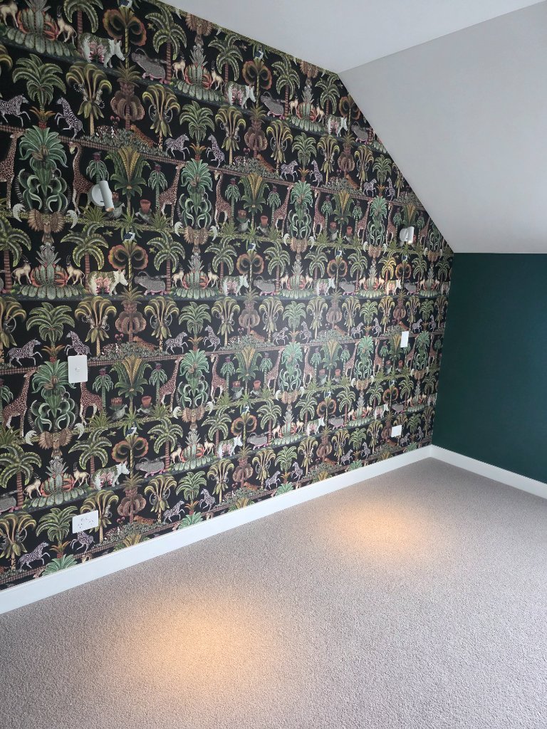 Bedroom lighting with feature wallpaper