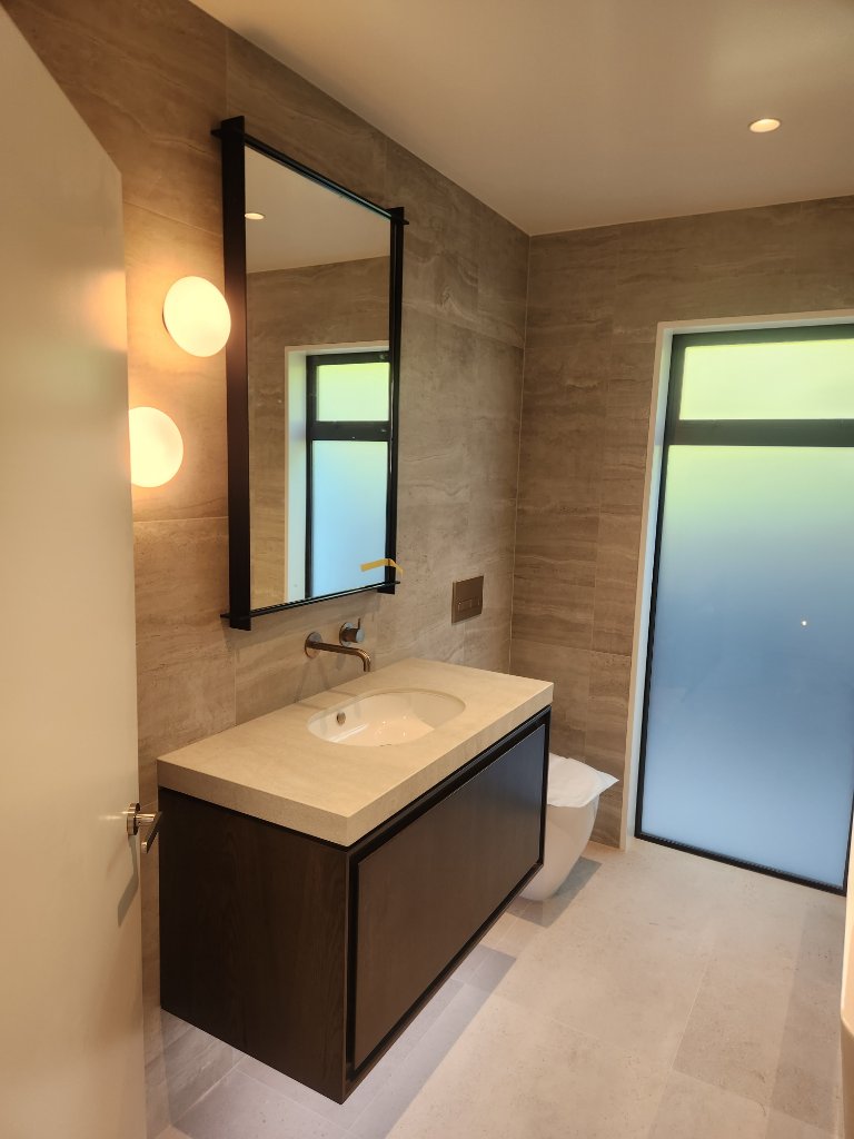 Luxury bathroom vanity with globe lights