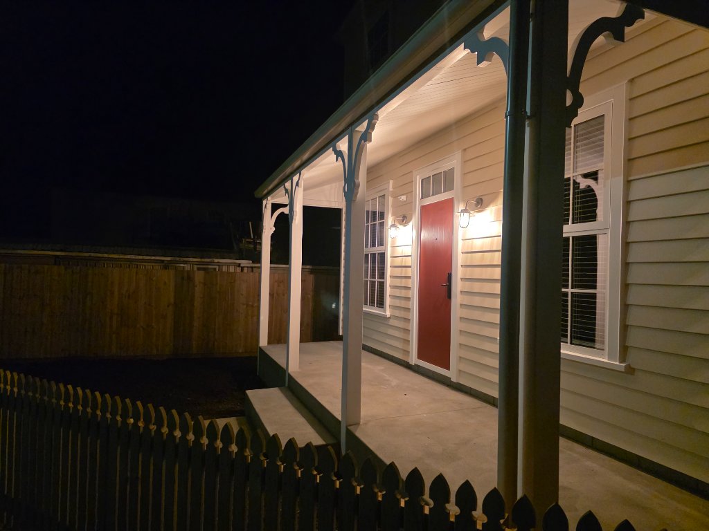 Villa porch with feature lighting at night