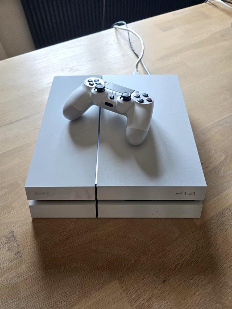 Sony PlayStation 4 500GB weiß inkl. Controller & 7 Spiele