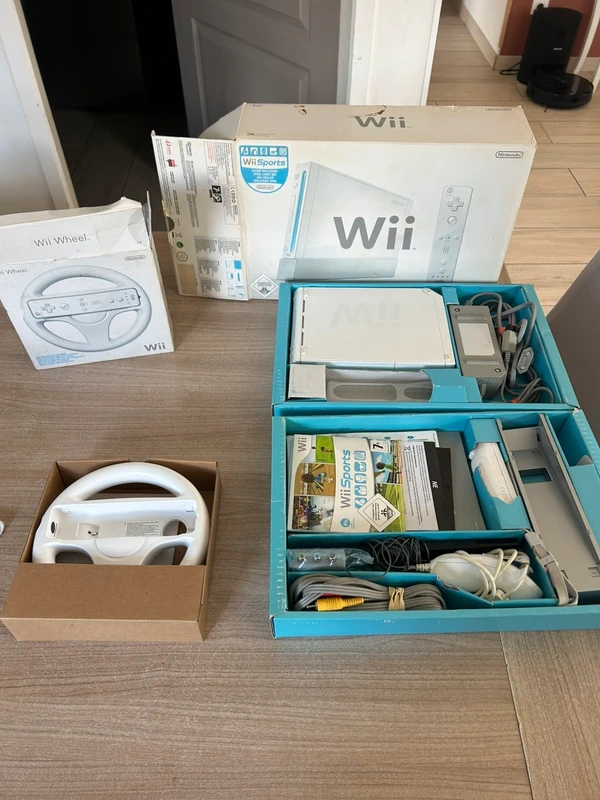 Nintendo Nintendo Wii Konsole mit OVP, Wii Sports + 2 Lenkräder