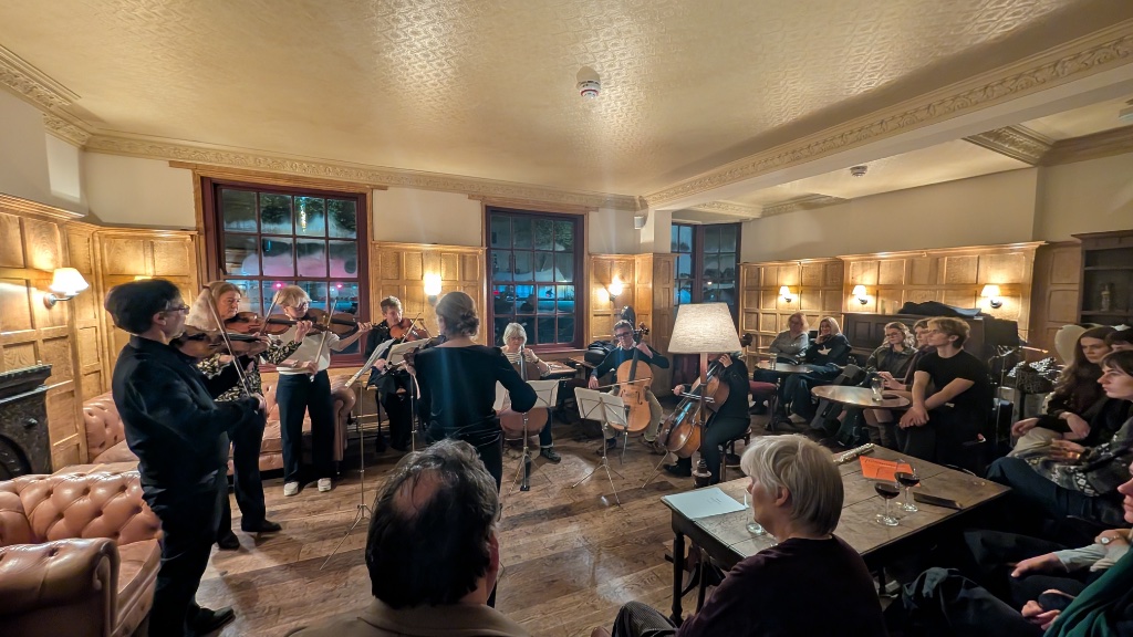 String ensemble performing in the Flag Room at the Lamb and Flag, Oxford