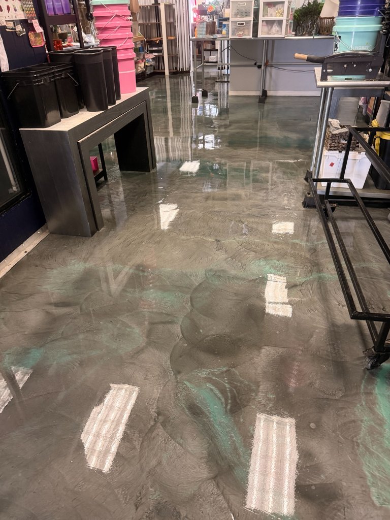 Reflective commercial floor after professional cleaning in craft supply retail store