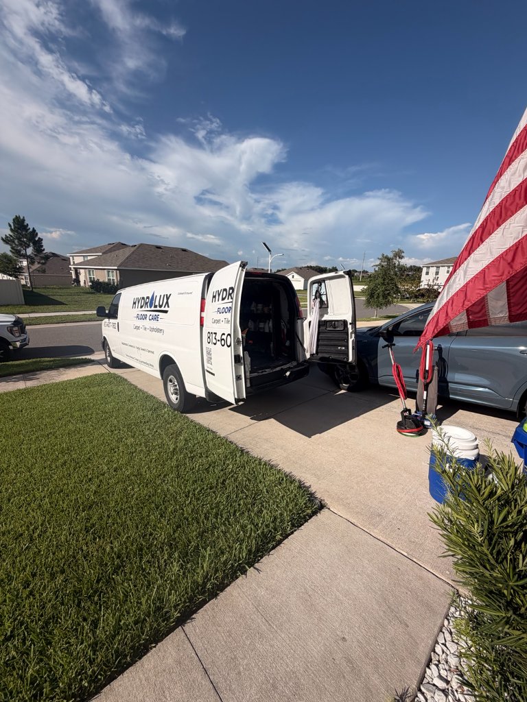 HydroLux Floor Care van in driveway of Florida home ready for professional floor cleaning service