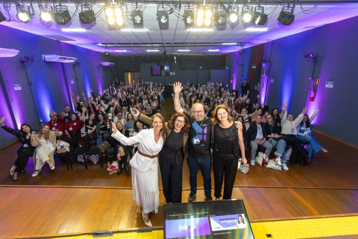 NEXO 2026 — palco com público no auditório