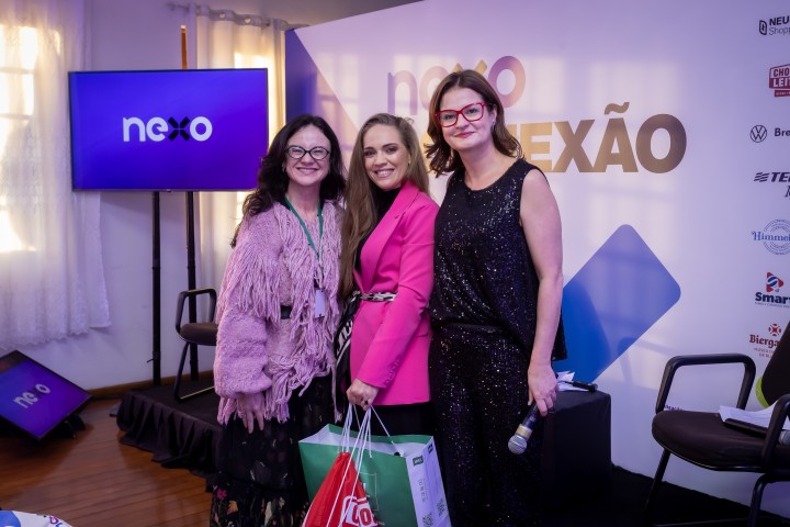 Três mulheres no palco do NEXO 2026