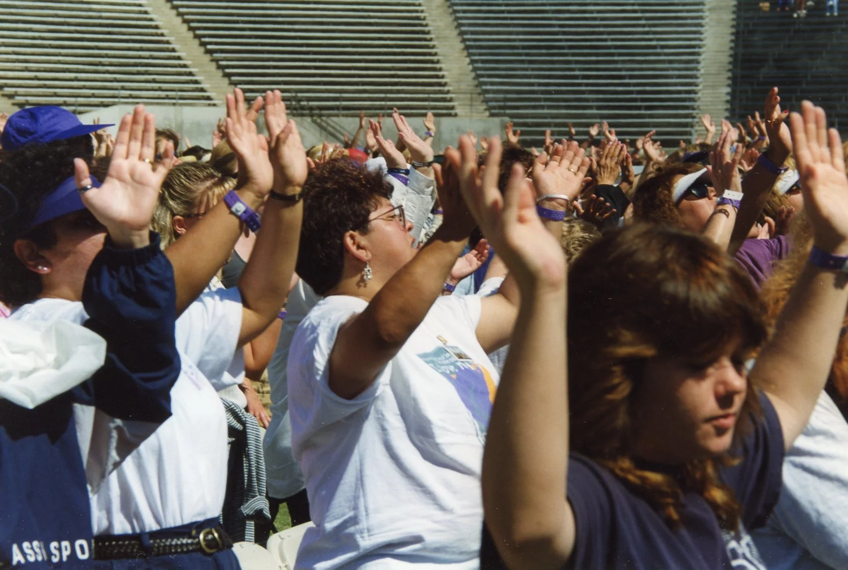 Women raising hands in worship