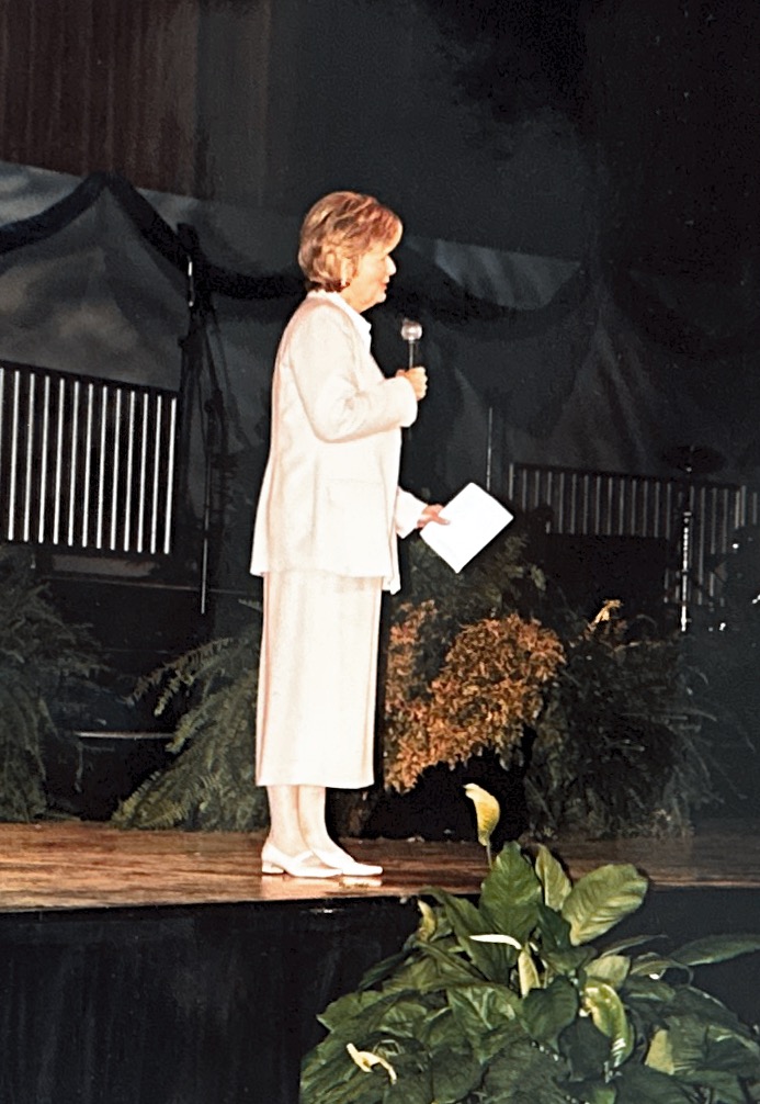 Susan Kimes speaking on stage