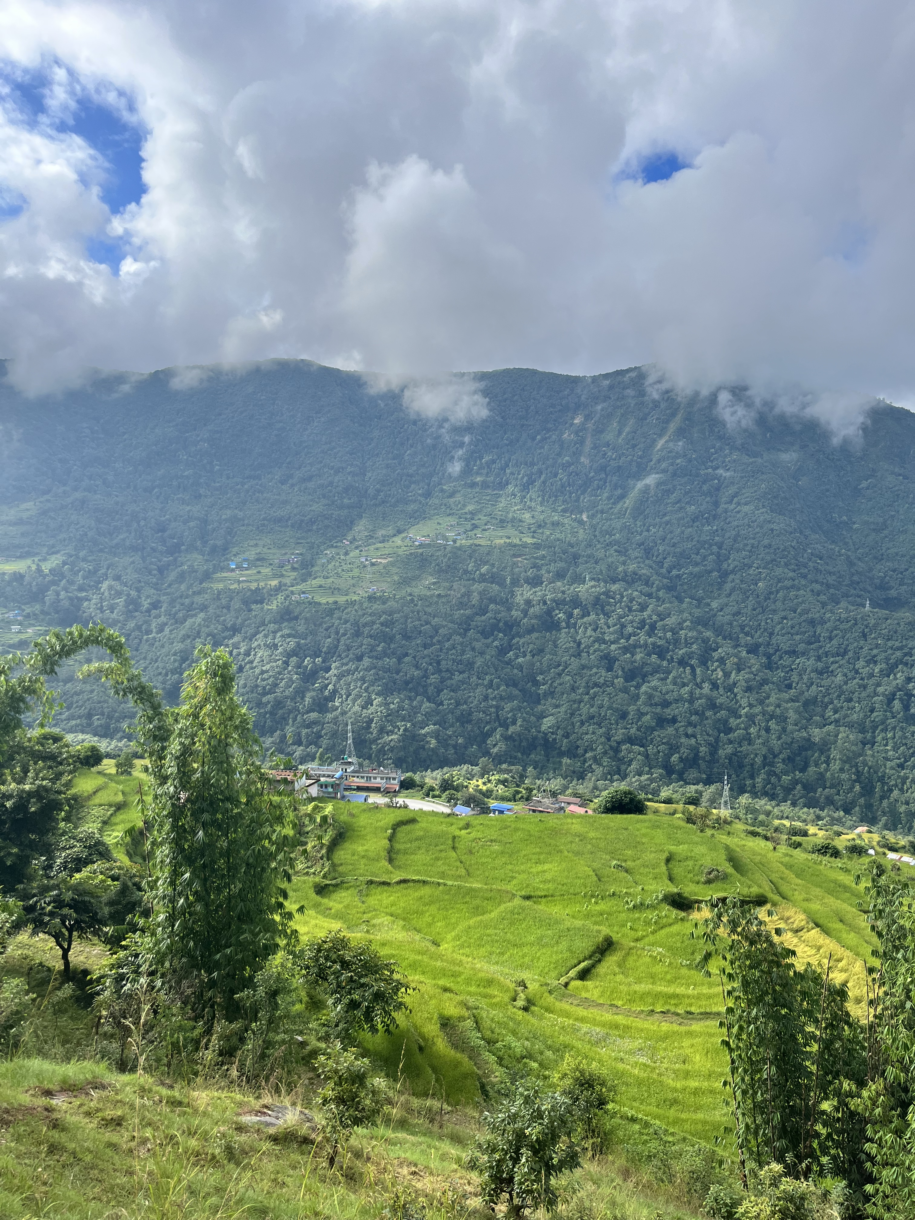 A terraced mountain valley in Nepal — the remote terrain where missions take root
