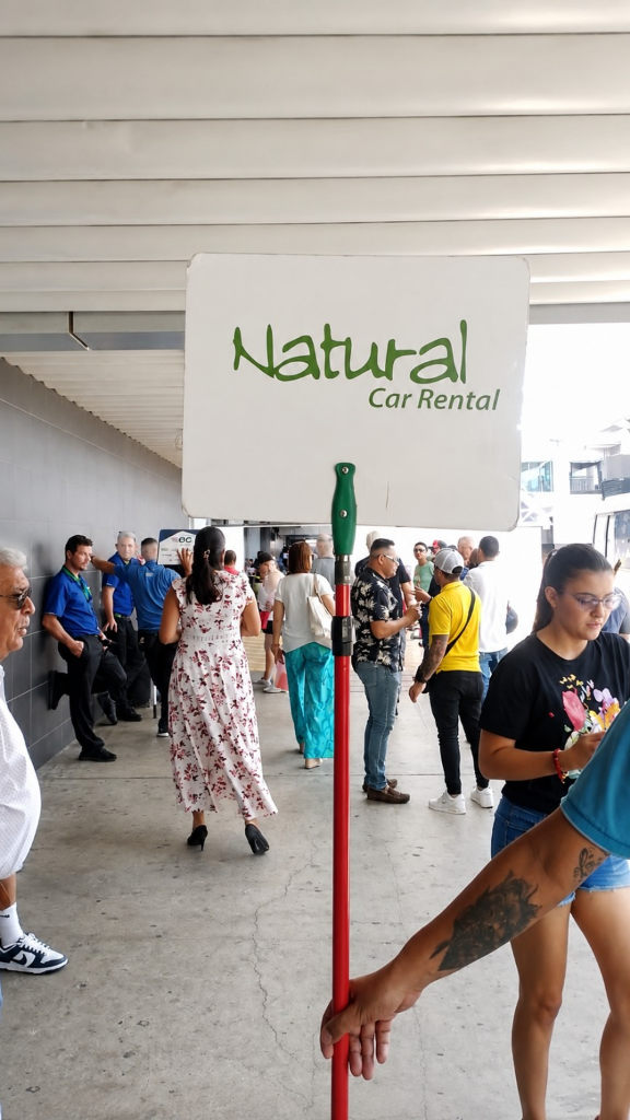 Natural Car Rental meeting point for customers arriving at the airport.