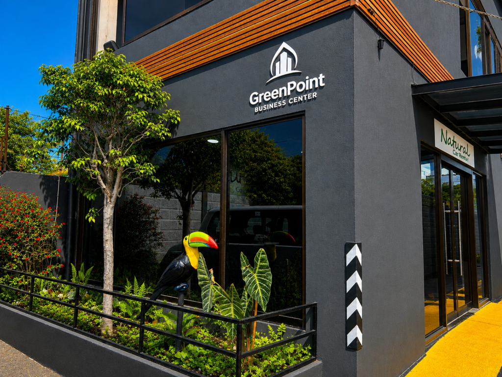 Exterior of the Natural Car Rental office at GreenPoint in Alajuela.