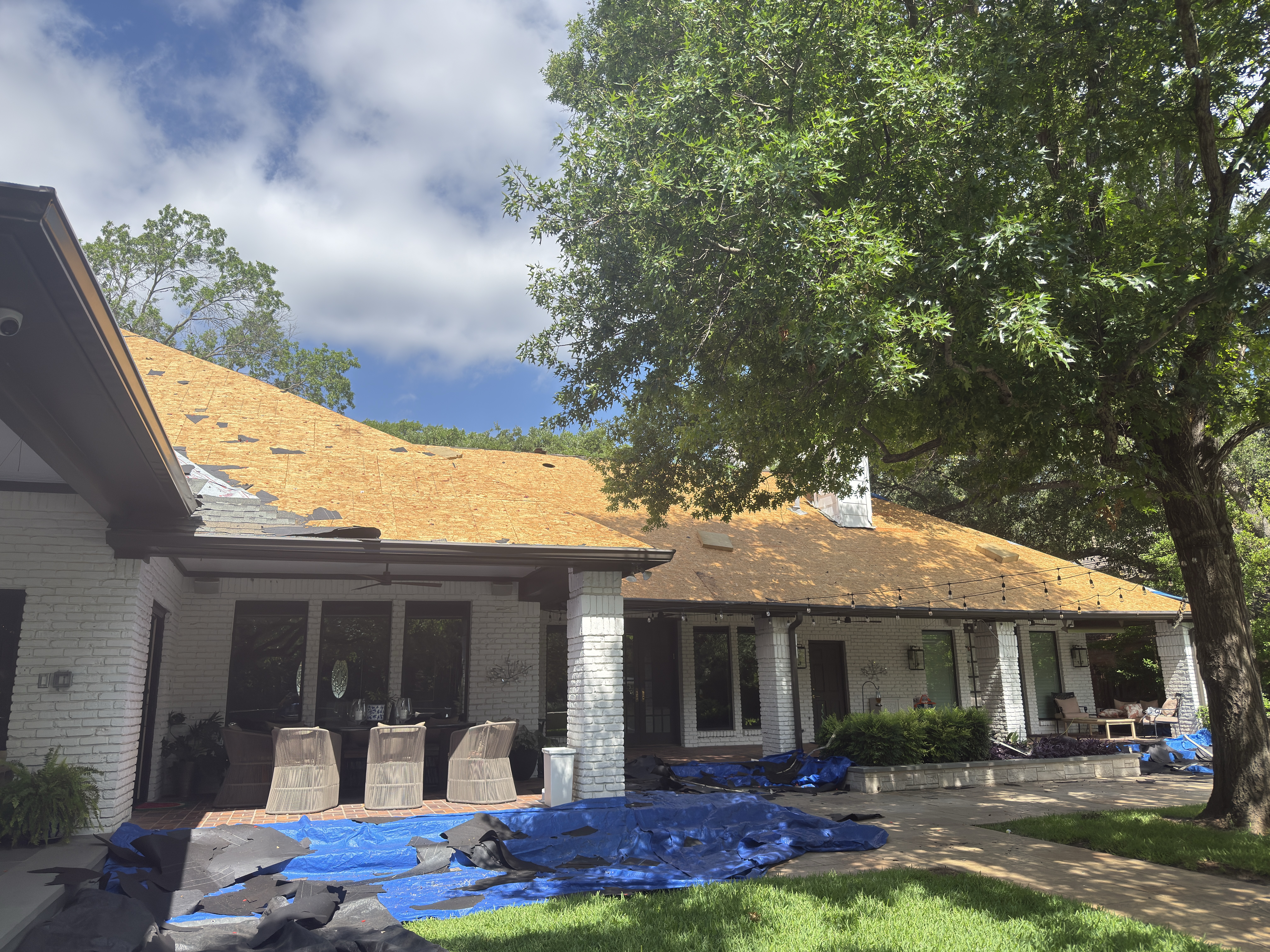 Roof deck stripped during a residential replacement by Roof Pros Dallas