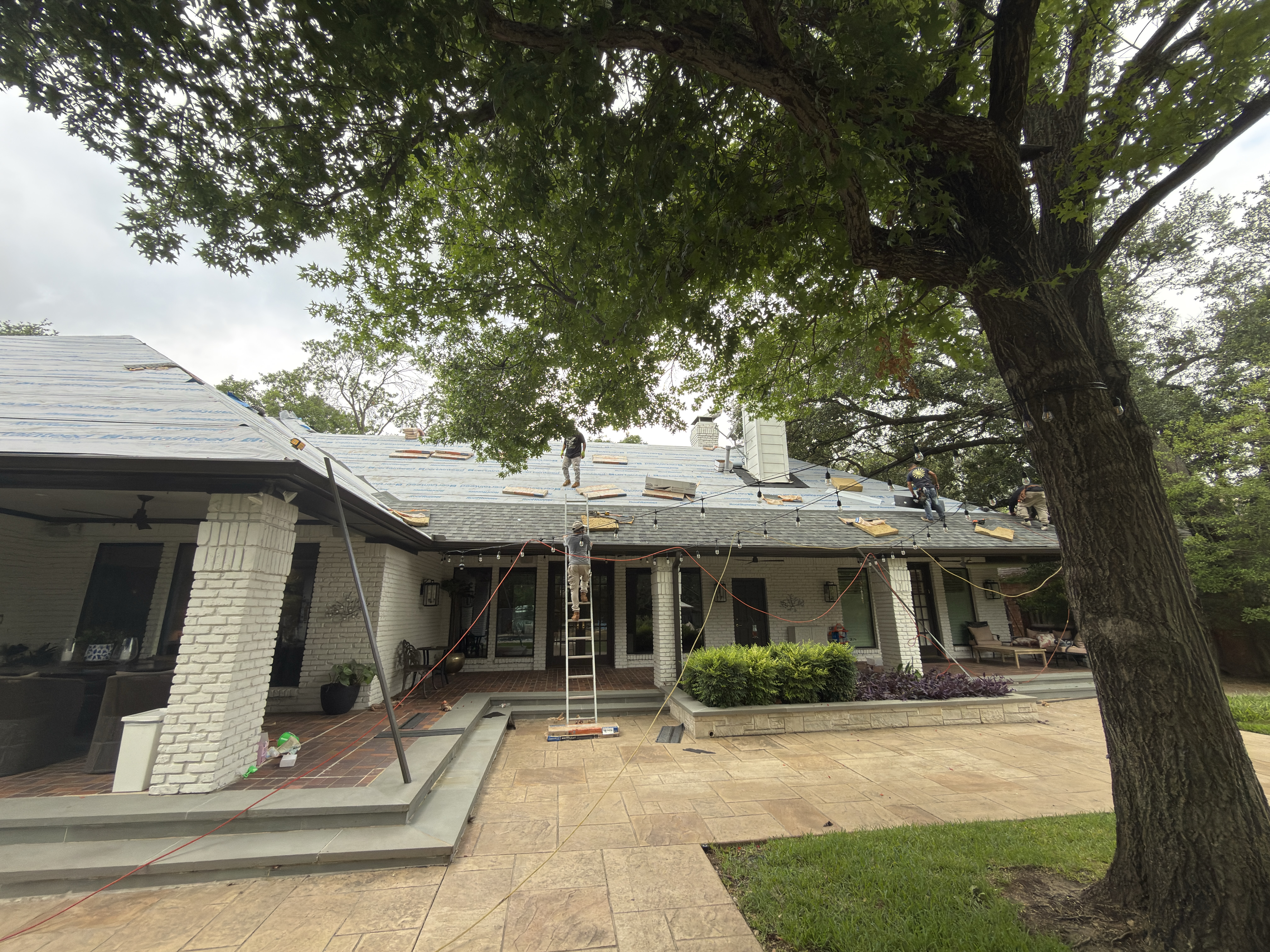 Roof deck exposed during a residential roof replacement by Roof Pros Dallas