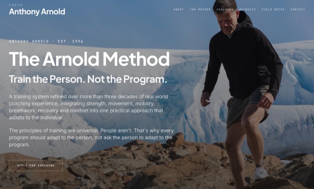 Anthony Arnold Coach — full-screen hero section featuring Anthony hiking across rocky Antarctic terrain toward a glacier