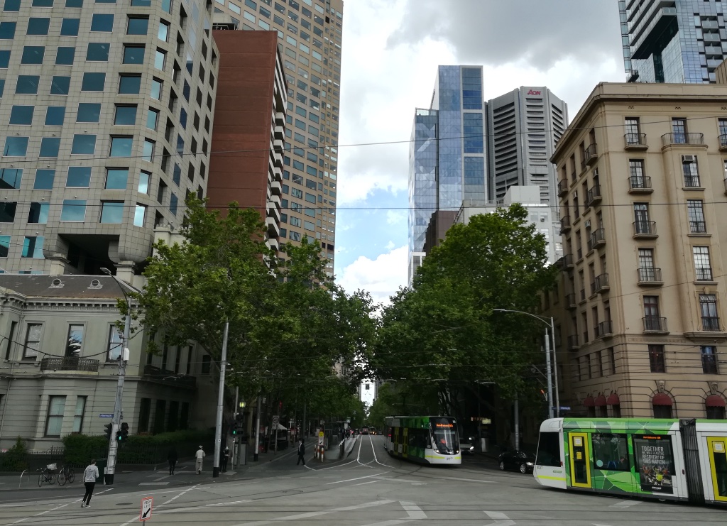 Collins Street, Melbourne — trams and towers at the eastern end of the financial district