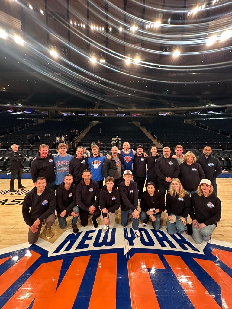 Dream Hoop Tours group on an NBA court