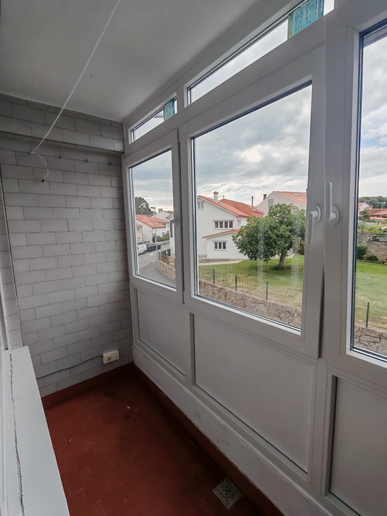 Cerramiento de galería con ventanas de PVC