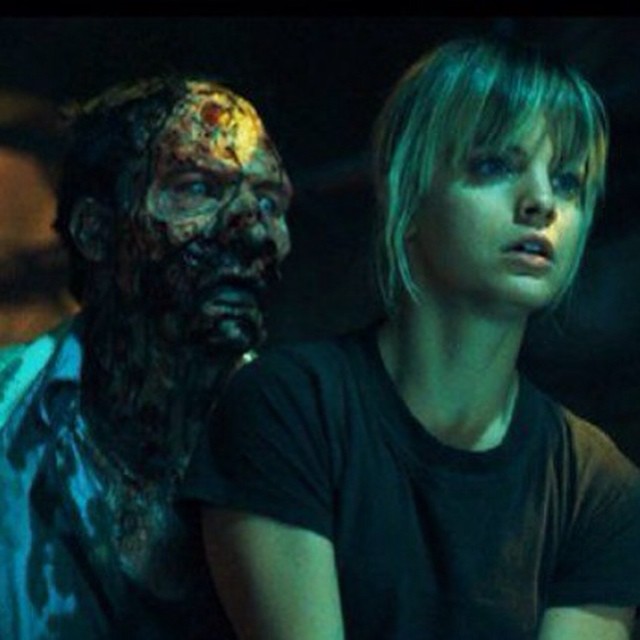 Zombie and victim horror scene