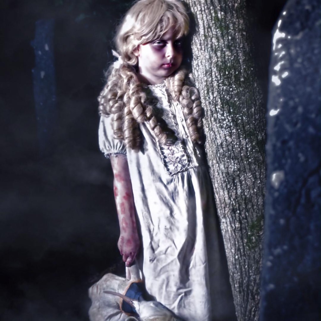 Ghostly girl by a tree