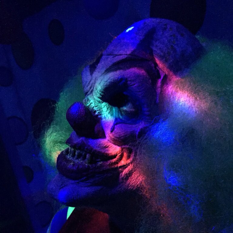 Creepy clown under black light