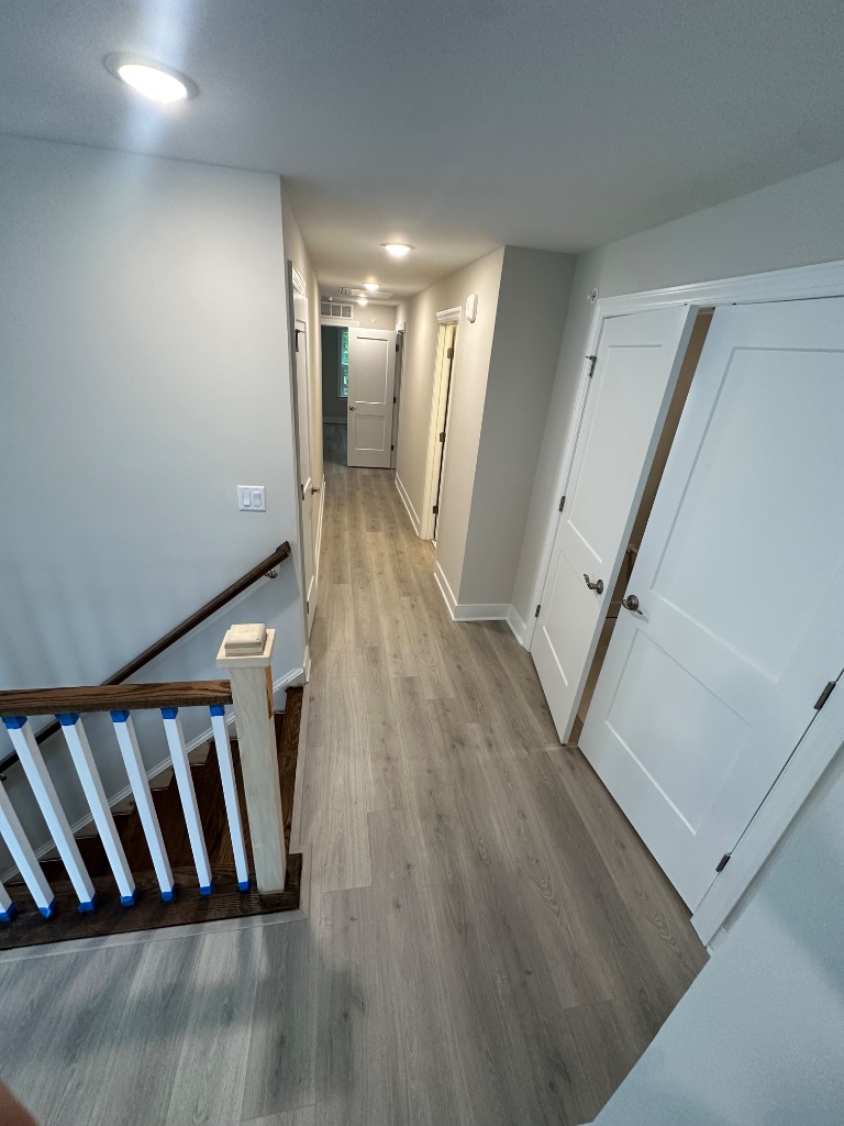 Beautifully stained hardwood floor by MB Flooring