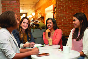 Community members sharing fellowship around a table