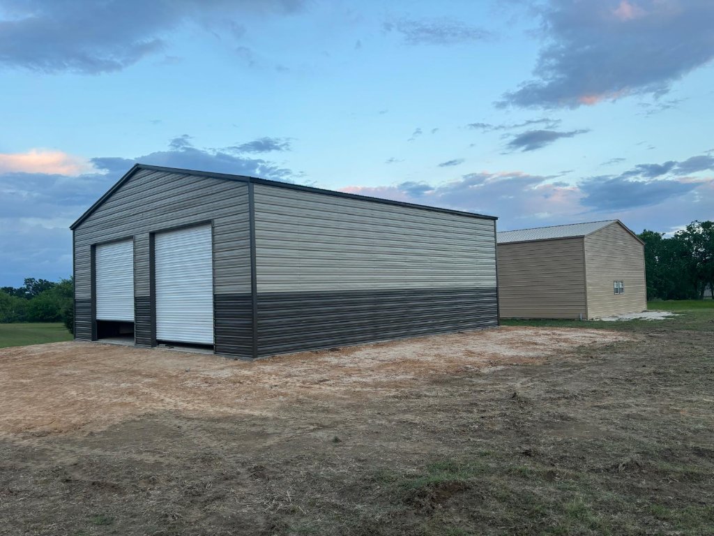 Custom metal garage with roll-up door built by Rough Country