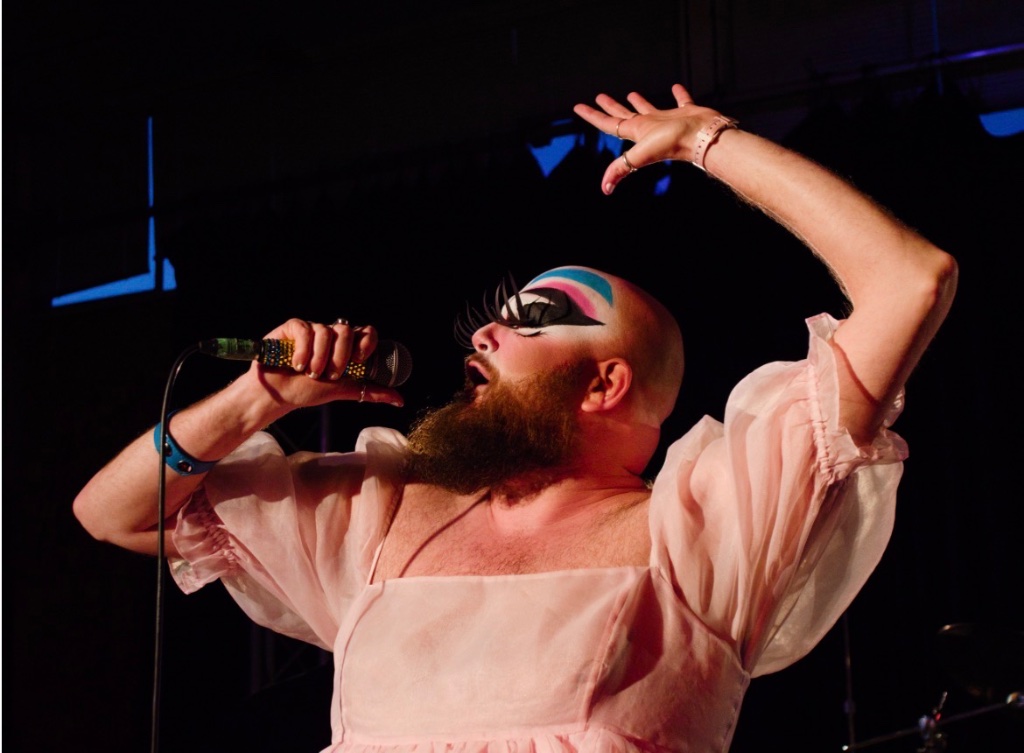 Dust Cwaine performing on stage