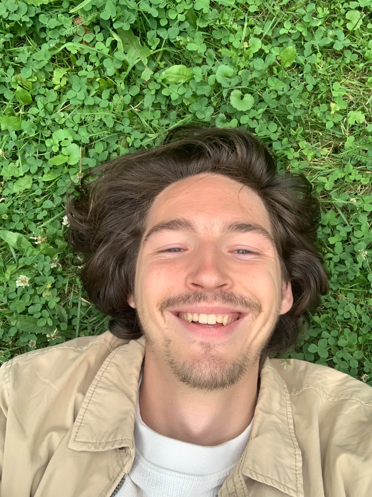 Quintin smiling in nature