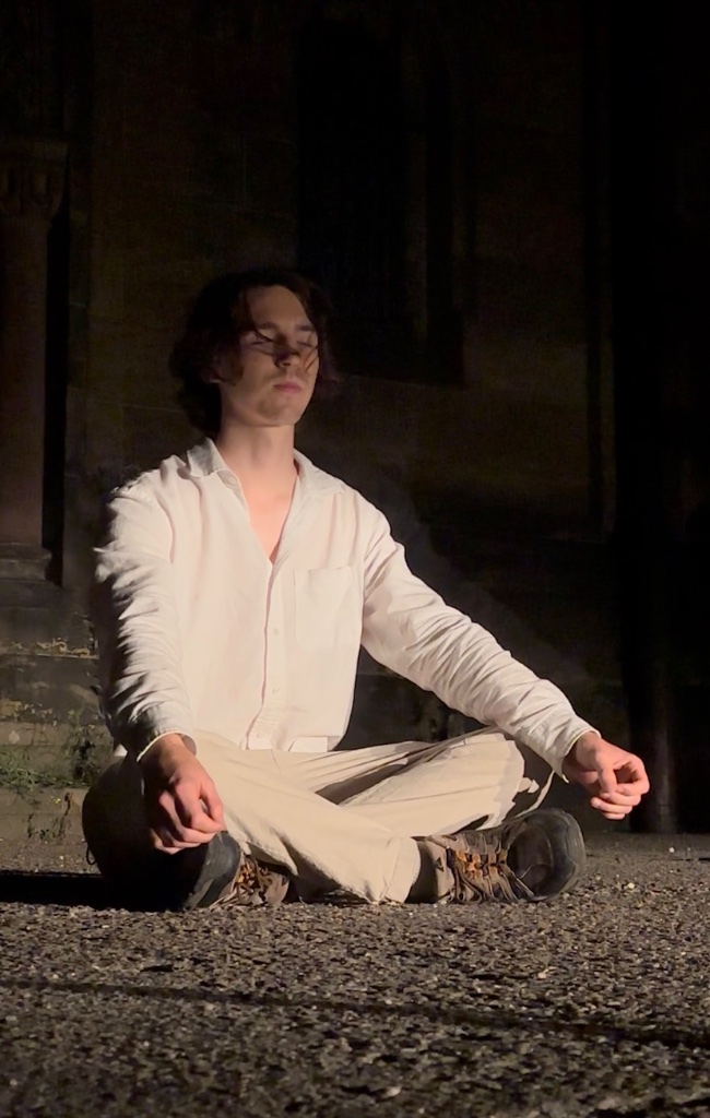 Quintin meditating at night