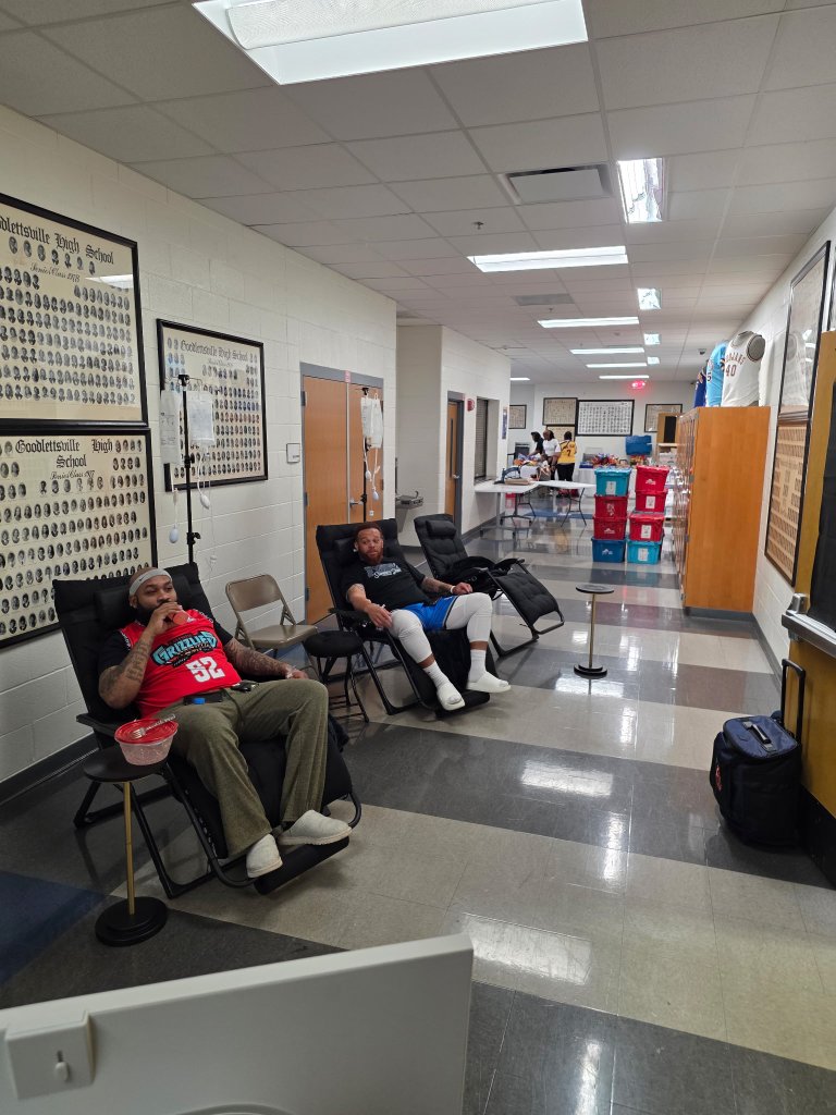 Athletes receiving IV hydration at community event – Radiant Health