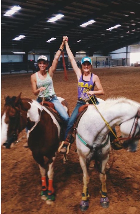 Camryn with a friend at Boys Ranch arena