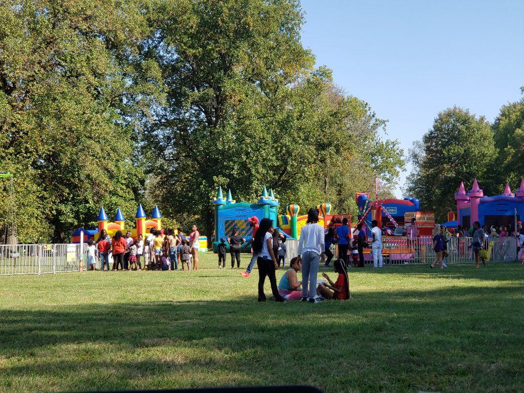 Festival-goers enjoying EMMAFEST in the park
