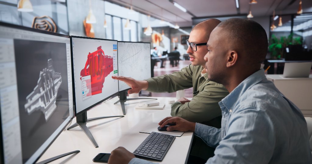 Engineers reviewing a CAD model together