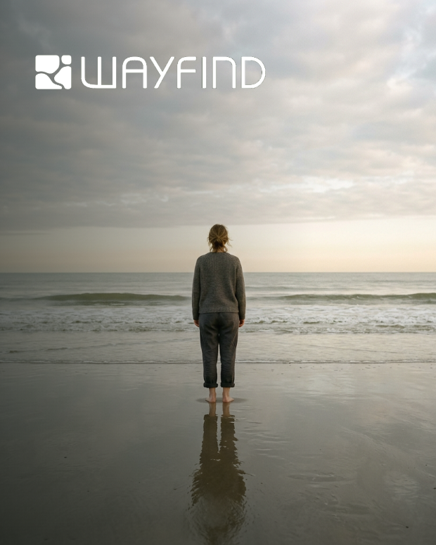 A person standing at the shore