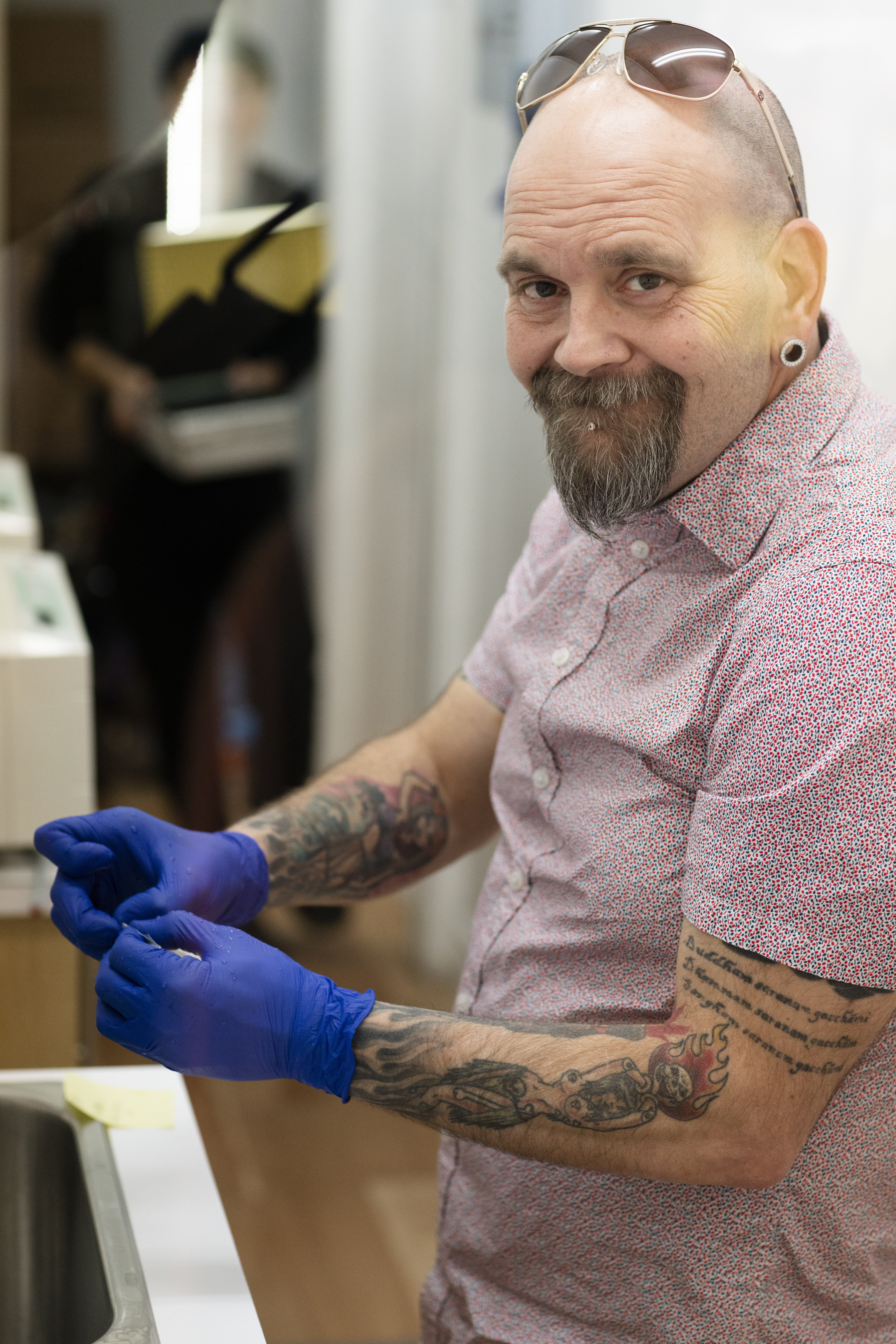 Keith Kennedy performing a piercing