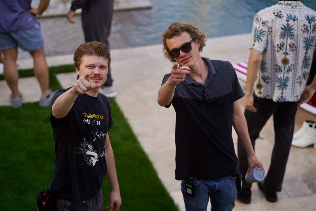 Two directors pointing on location